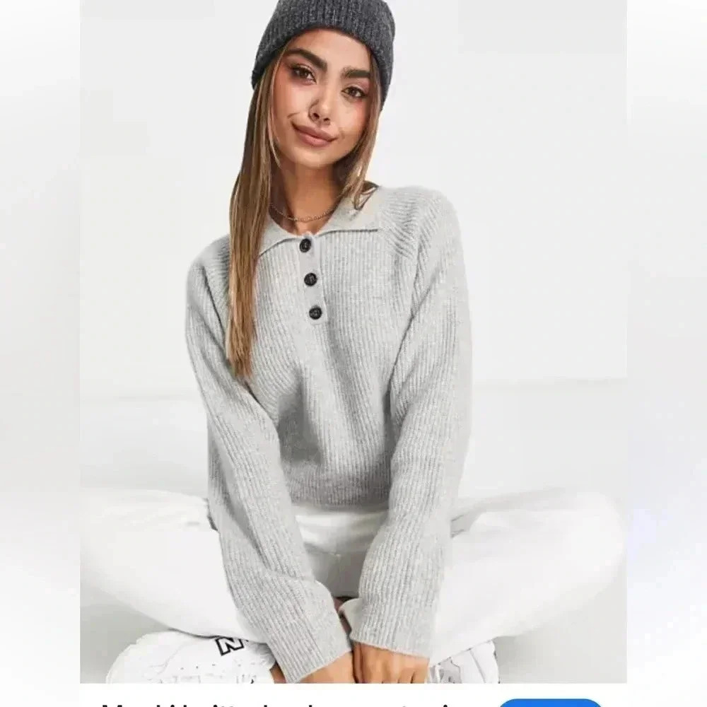 Monki (Stockholm) size medium cotton blend blue polo style sweater.